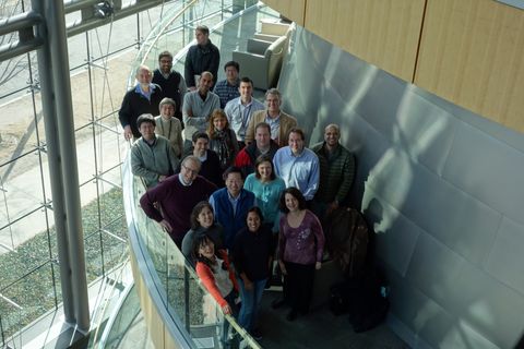 a group of people standing on a staircase